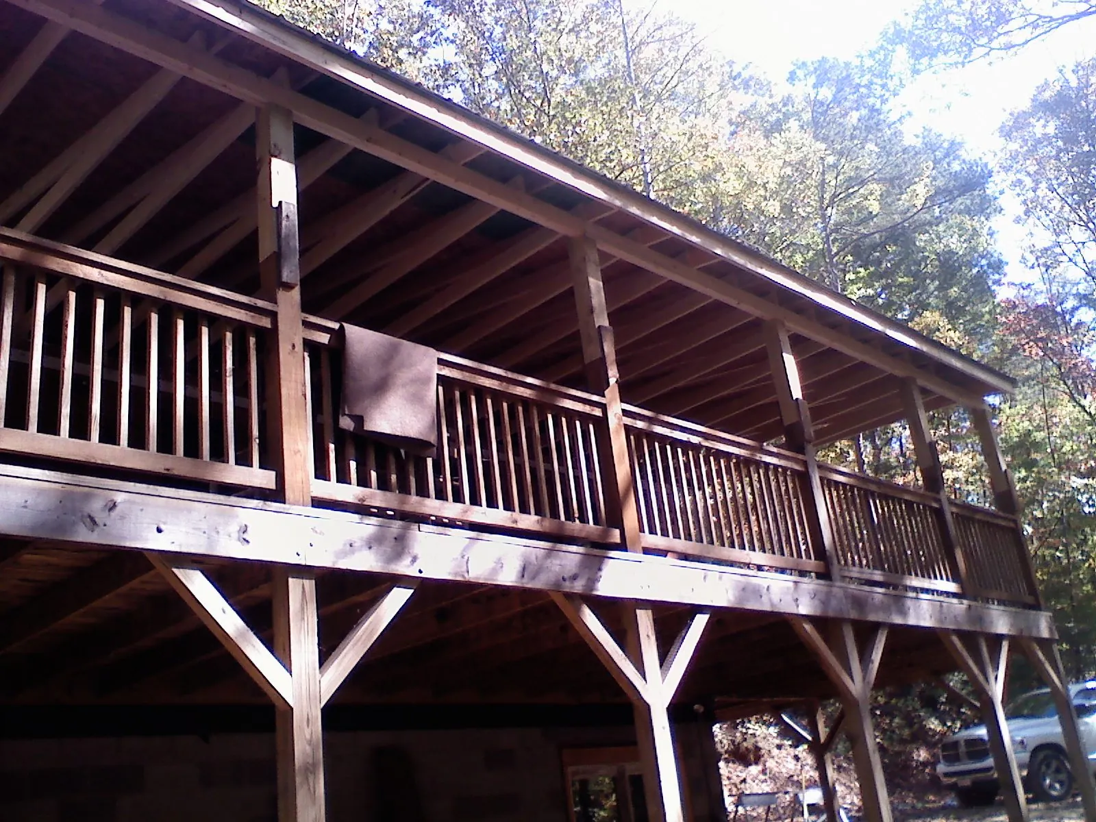 Timber framing under a new elevated porch and deck — Roof Leak Repair in New Harmony by Roofing Brothers